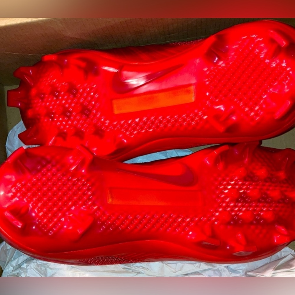 Red nike cleats